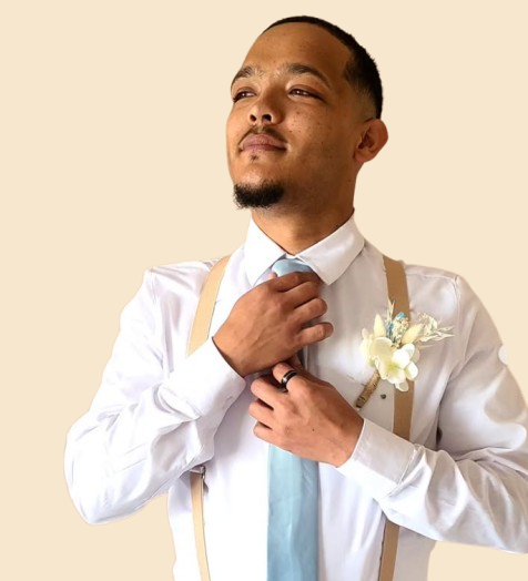 Llewellyn Mouton adjusting his tie, groomsman